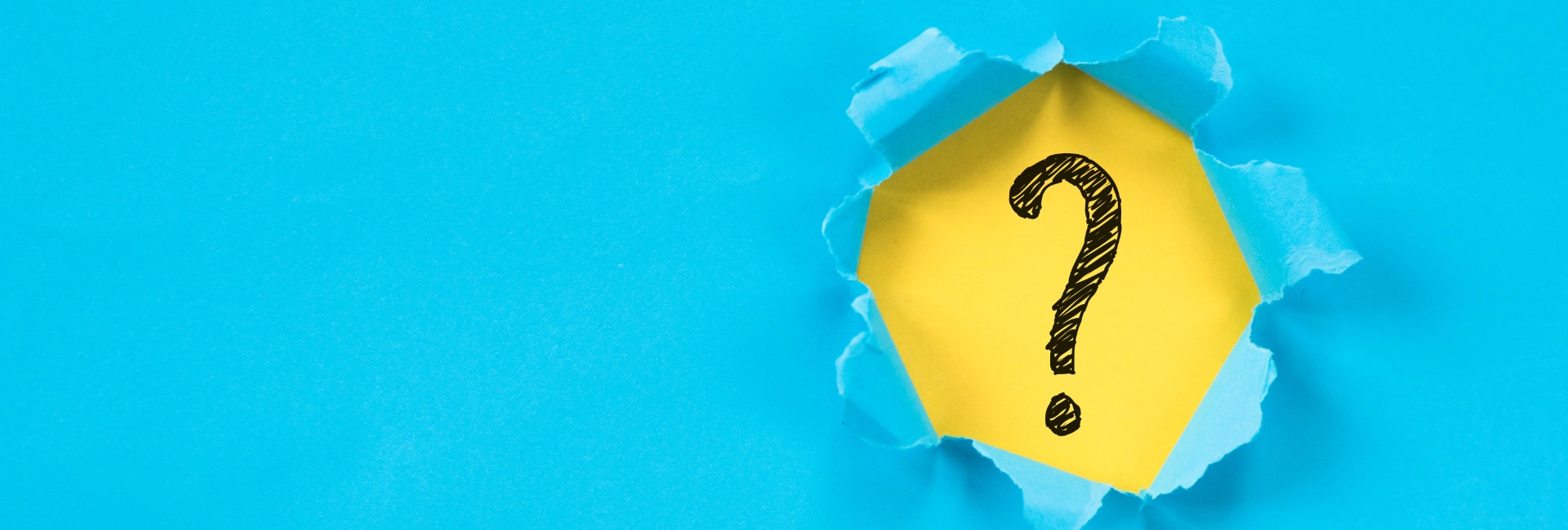 Blue Paper Puncture Reveals Question Mark 1920X650